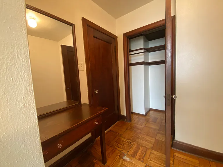 Dressing room has original vanity and large closet.