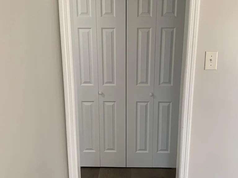 Utility room closet with new water heater and HVAC system