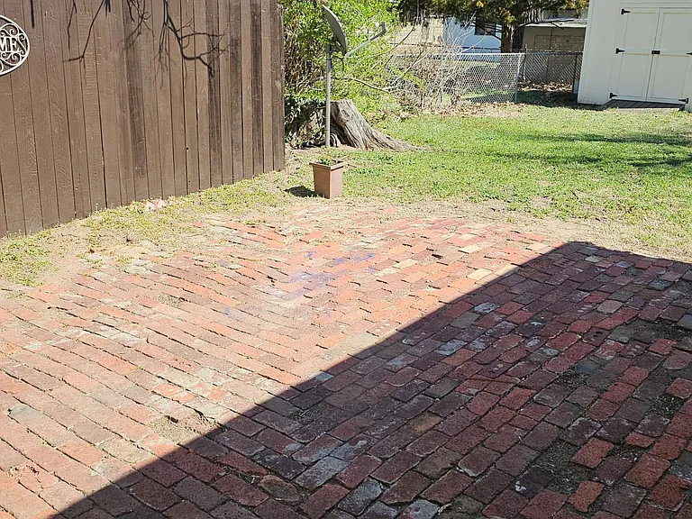 Patio area. Shed in the background.