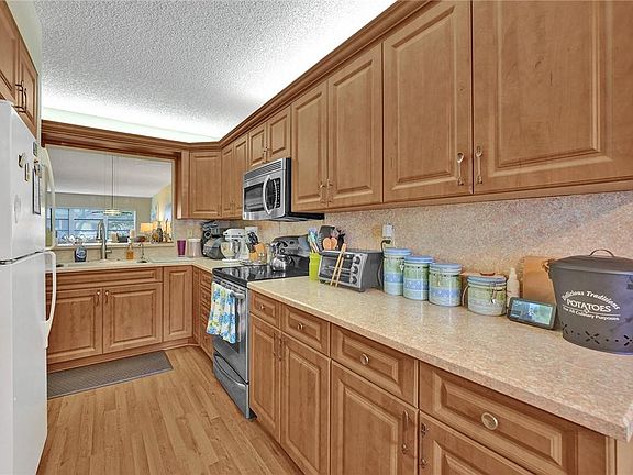2nd image of 5710 Princess Palm Court #A