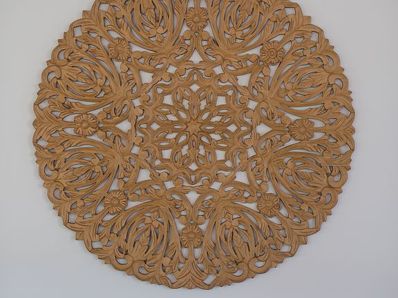 4' diameter hand carved art.