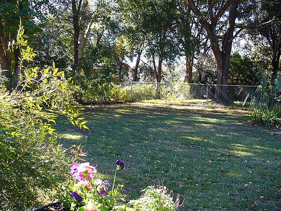 1/2 ac lot/ private backyard