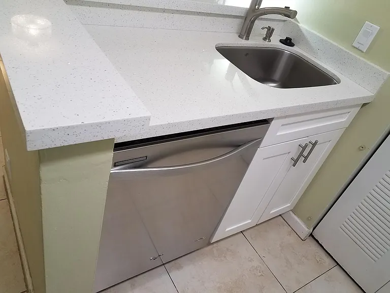 Dishwasher in kitchen island. Part of an extremely functional kitchen.