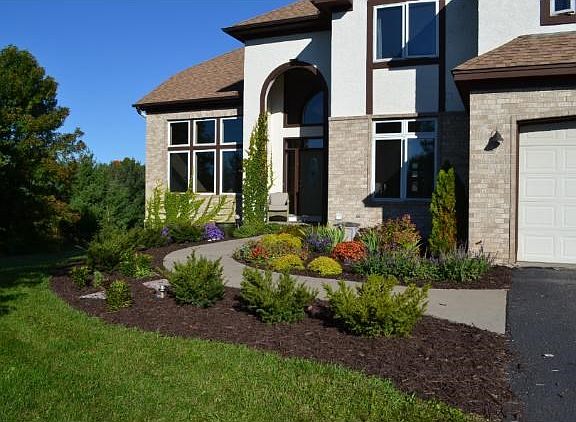 The owners have cared for the home and you will discover they added many recent updates including this beautiful front garden. The exterior of the home is redwood, brick and stucco.