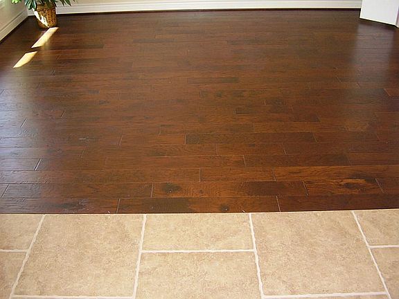 Up close view of the wood & tile transition.