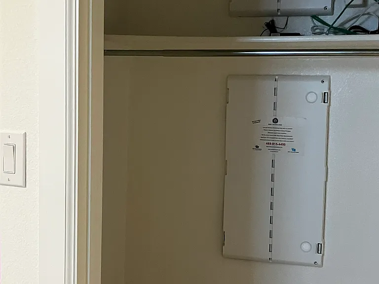 office/study/guest bedroom closet houses power panels