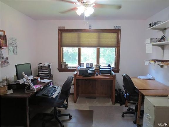 Den office on first floor off of living room there are 4 or 5 phone lines for this home plus DSL line