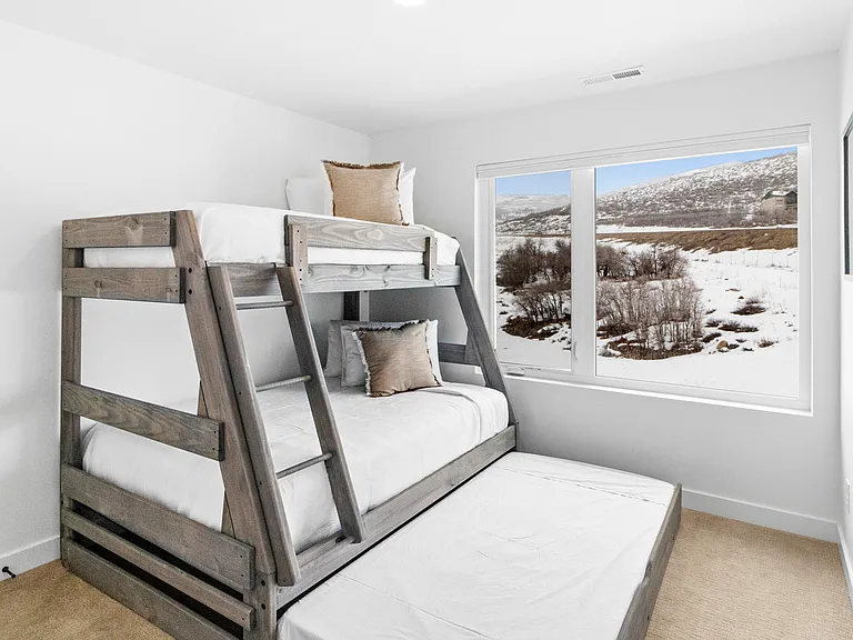 Bedroom 3 with Twin over Full Bunk and Twin Trundle Bed (top floor)