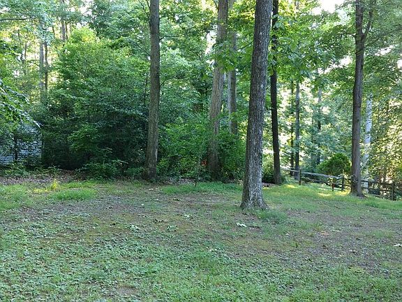 Large Wooded Fenced In Back Yard