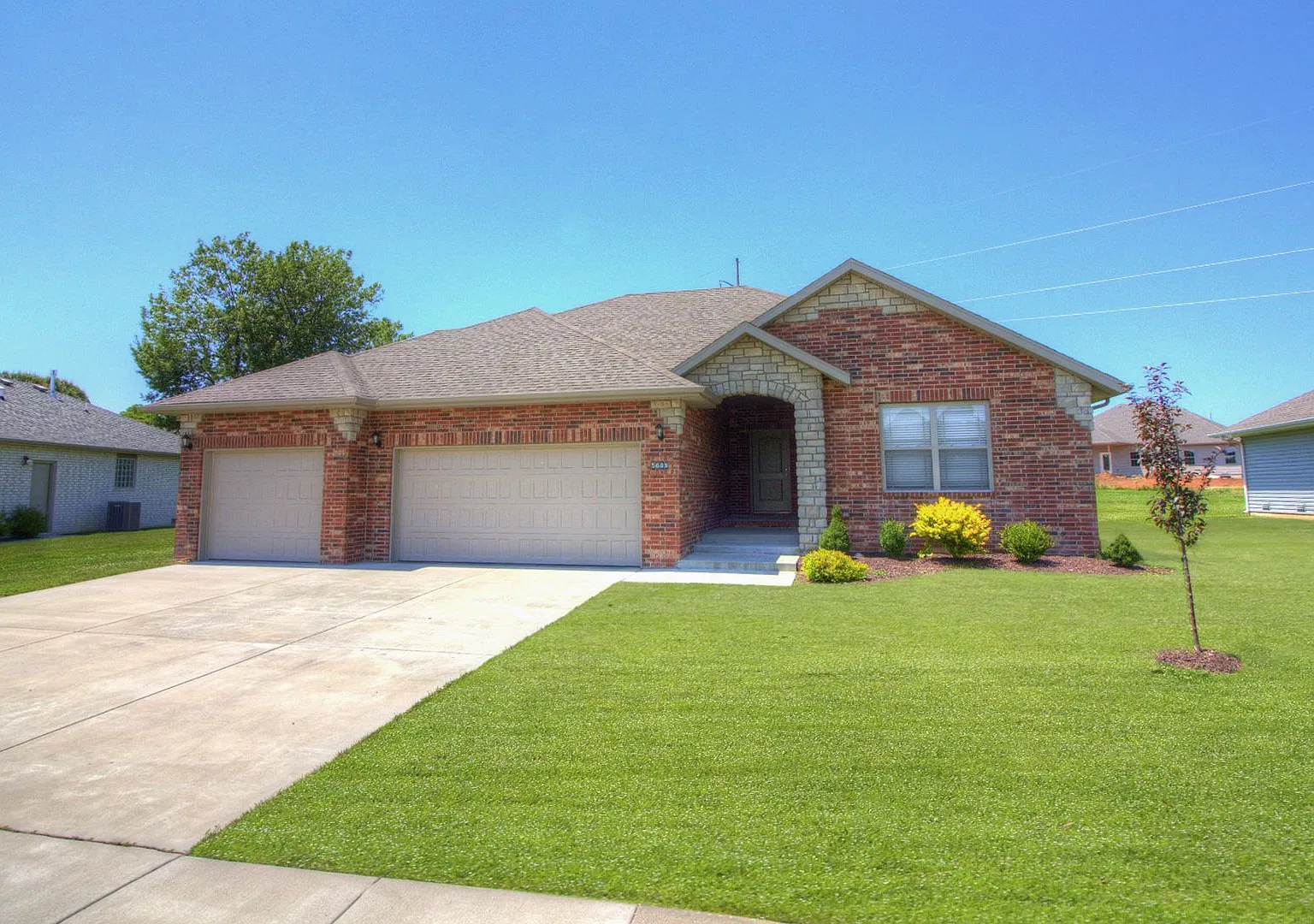 4 Bedroom Home with Fenced Yard and 3-Car Garage — Photo 1