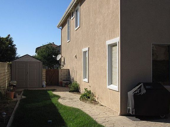 Extra large side yard due to the location of this home, next to the greenbelt!