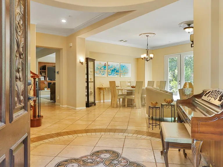 Foyer with tile mosaic floor