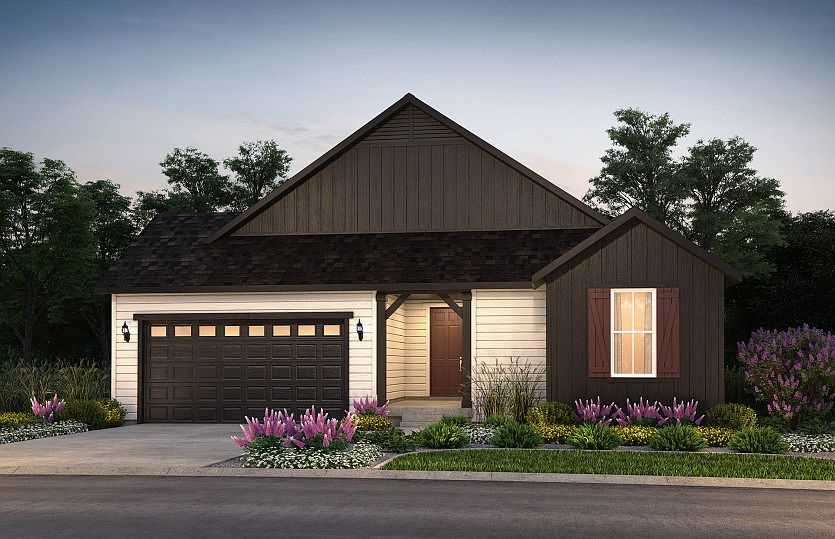 The Parklane shown in Elevation A designed with classic shake siding, and pitched gable roofs