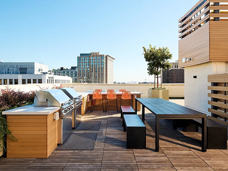 Take in a night of dramatic views and fun from two rooftop decks offering grills, firepits and even a dog run.