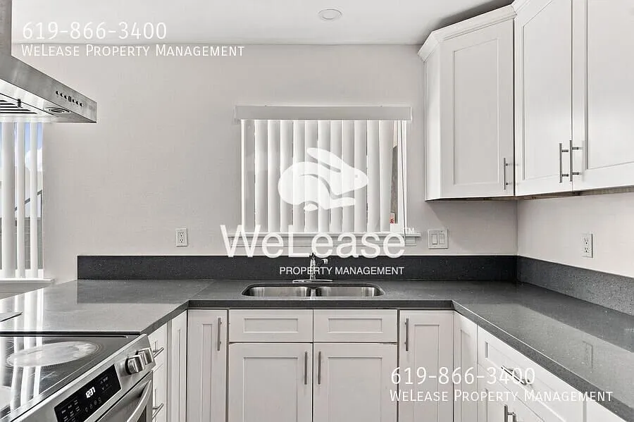 Newly renovated home with on-site laundry room! $1000 Off First Months Rent — Photo 1