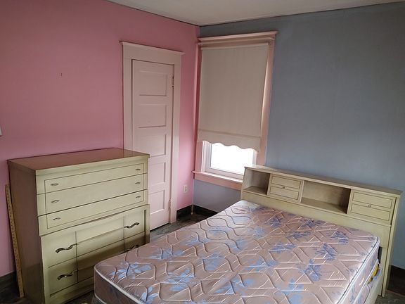master bedroom with matching furniture