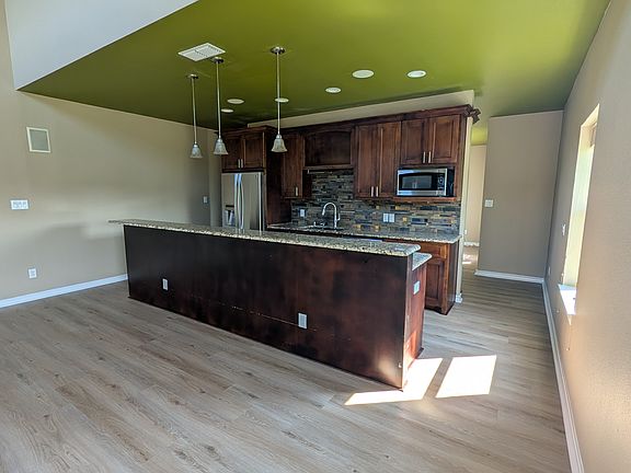 The living room and kitchen