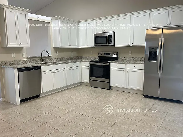 7110 Briggs Ave — Photo 6