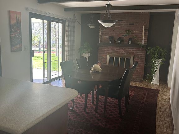 Dining room with access to patio and backyard