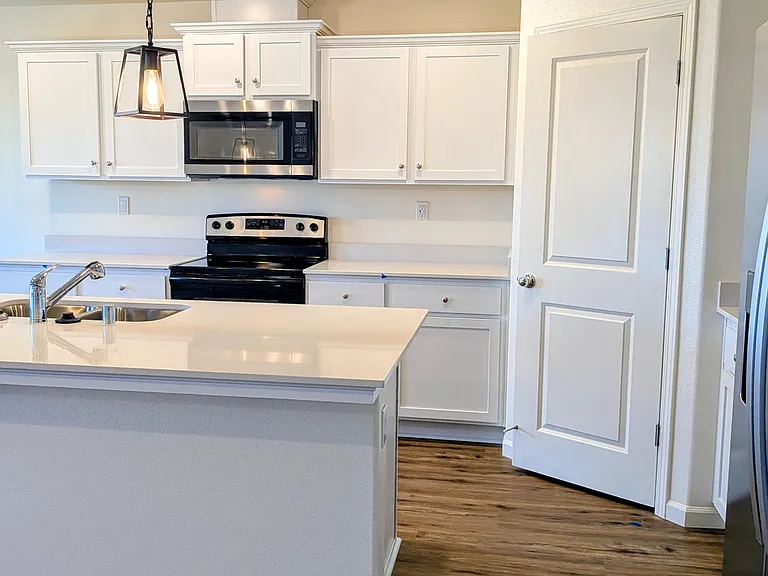 7162 W Wren Ave — Photo 6