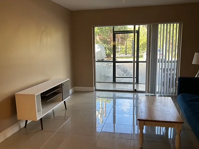 white TV stand in furnished living room