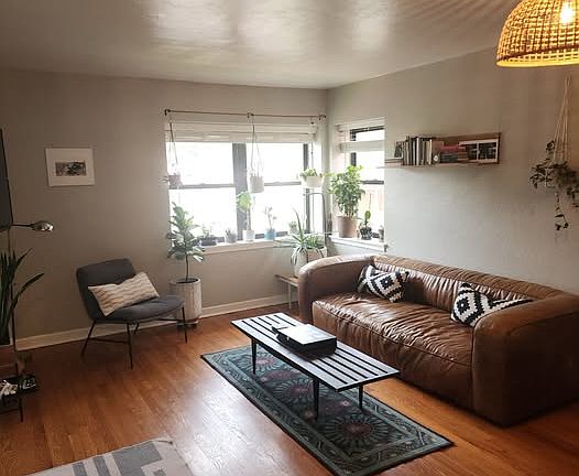 This photo is from another tenant's living room shown for visual/proportional purposes. This listing is for an unfurnished apartment.