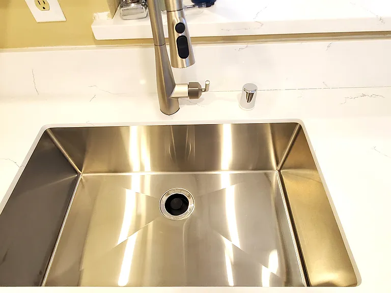 Brand new kitchen sink and faucet