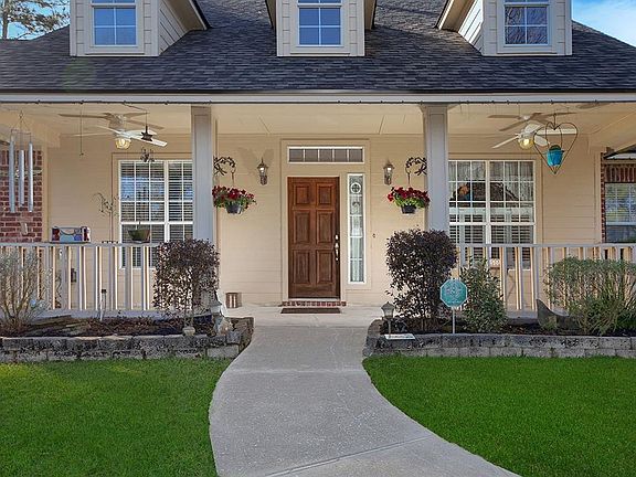 A recently replaced roof, Kohler whole house generator, Rainsoft whole house water system, recently replaced windows in the master bedroom and recent exterior paint add peace of mind to the tranquil lifestyle offered in White Oak Estates...