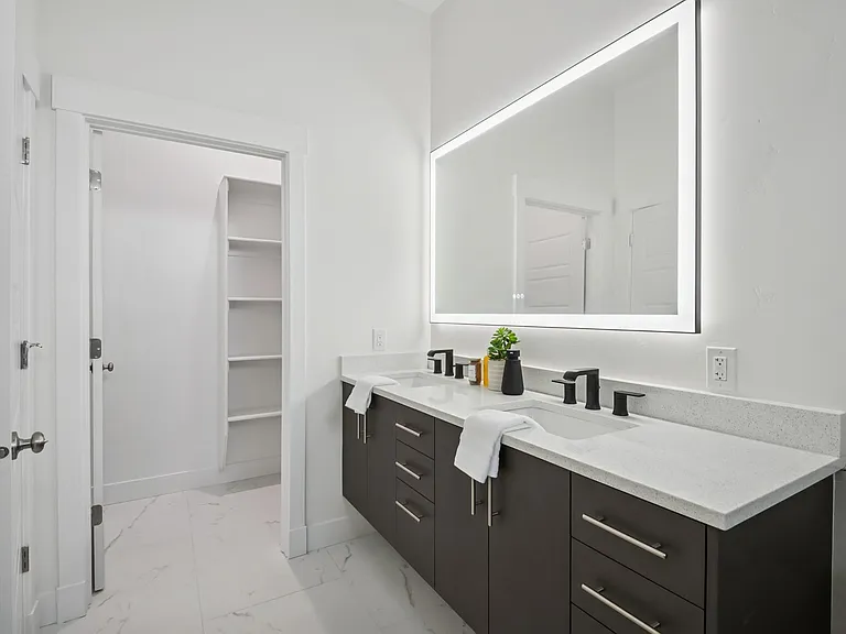 Master Double Vanity & Walk in Closet.