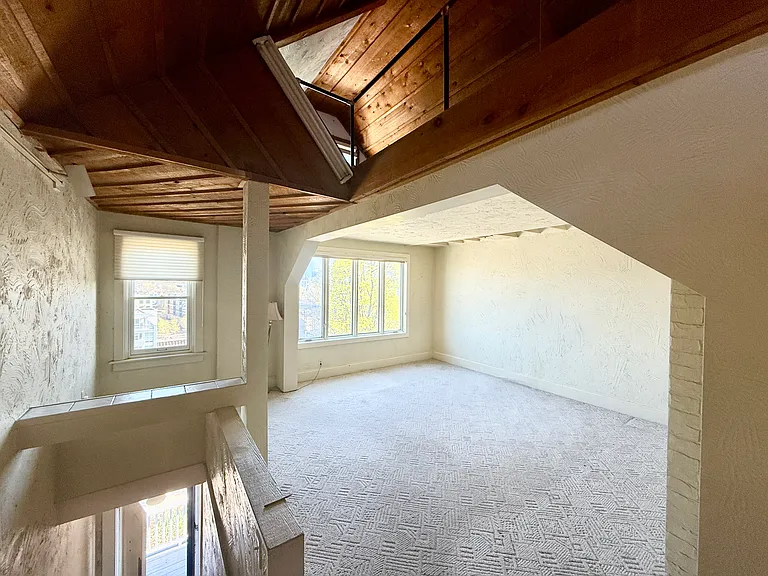 First floor living area with loft above