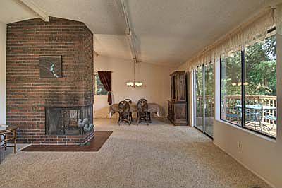 Living to dining..warm double sided fireplace.