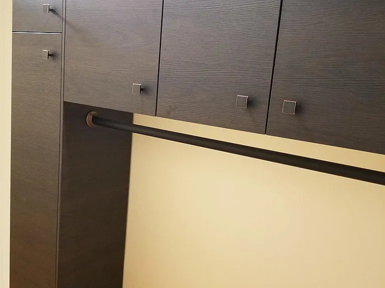 Master walk-in closet with nice storage options. More room to hang clothing off picture. .