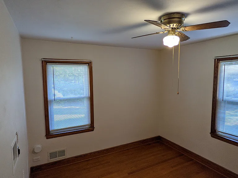 Second bedroom window view. Located on the main floor. It can also be used as a laundry room.