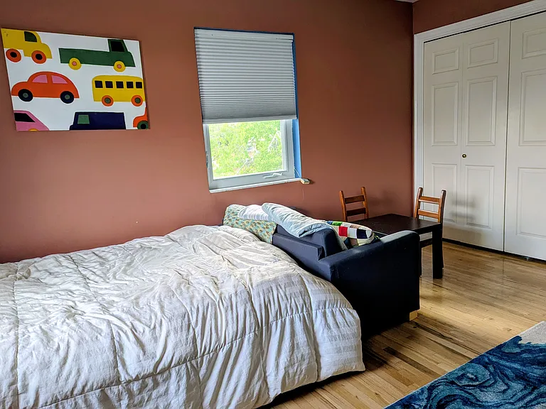 Second upstairs bedroom with closets