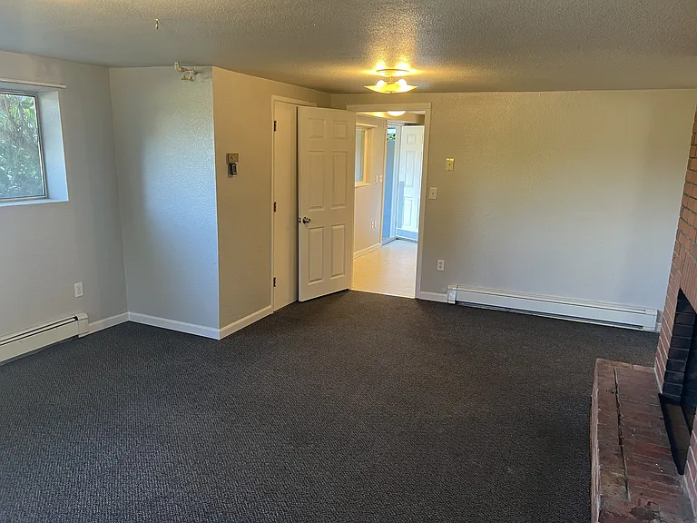 downstairs living room, view towards kitchen