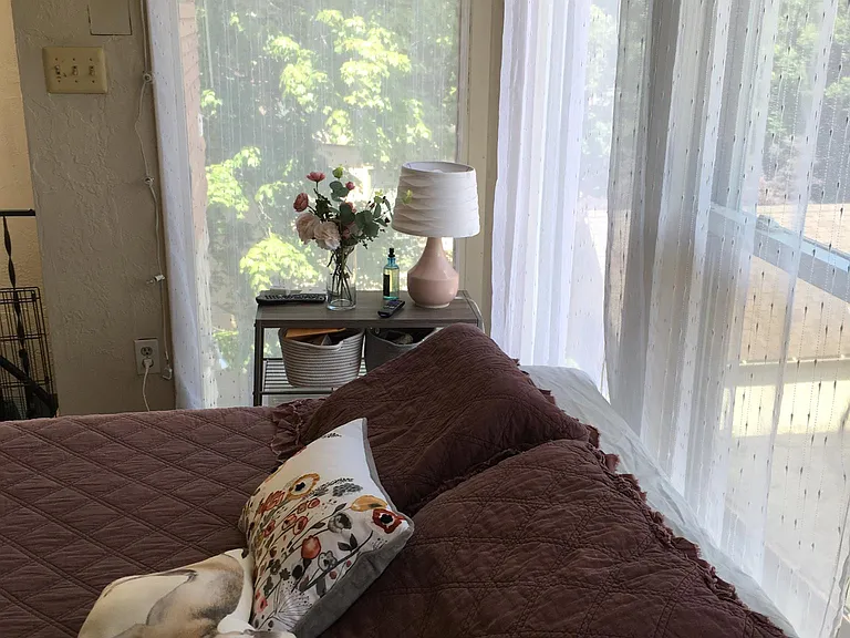 Bright bedroom retreat with generous window