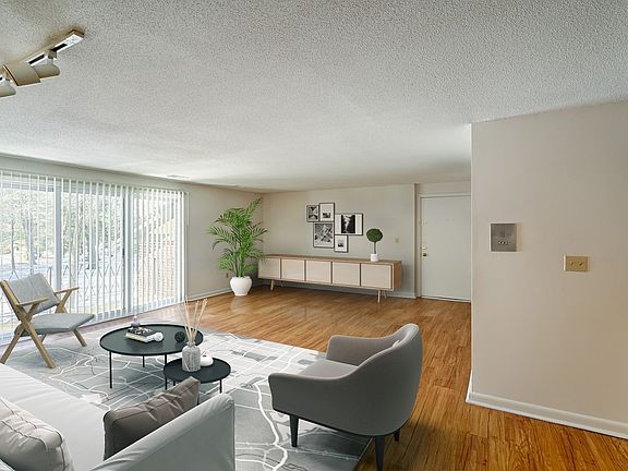 Bright and spacious living room with patio access