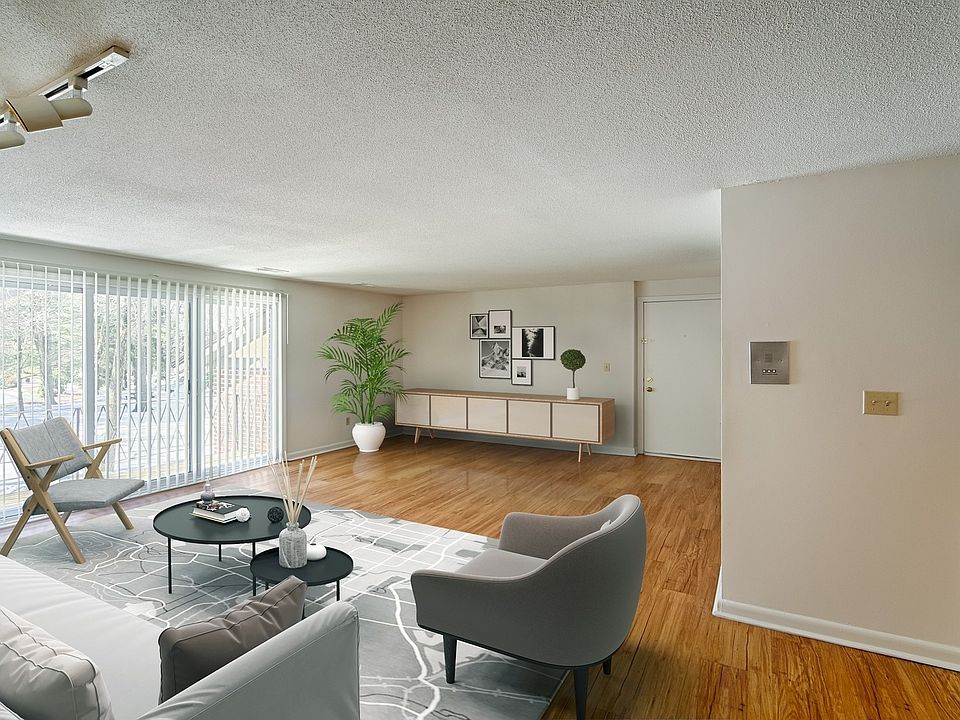 Bright and spacious living room with patio access