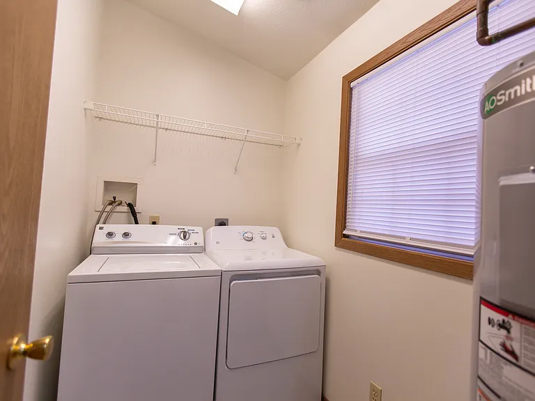 Cedar Ridge Laundry Room (floor plans may vary; some feature sliding doors, while others are enclosed rooms)