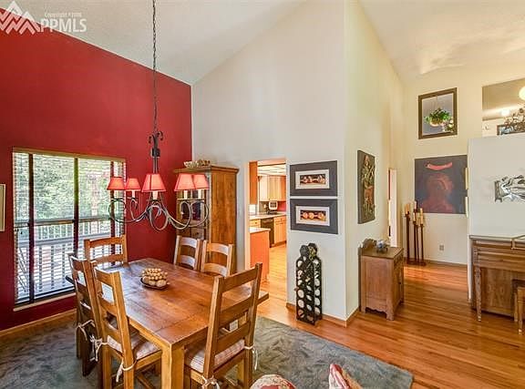 Dining room view into living room & kitchen