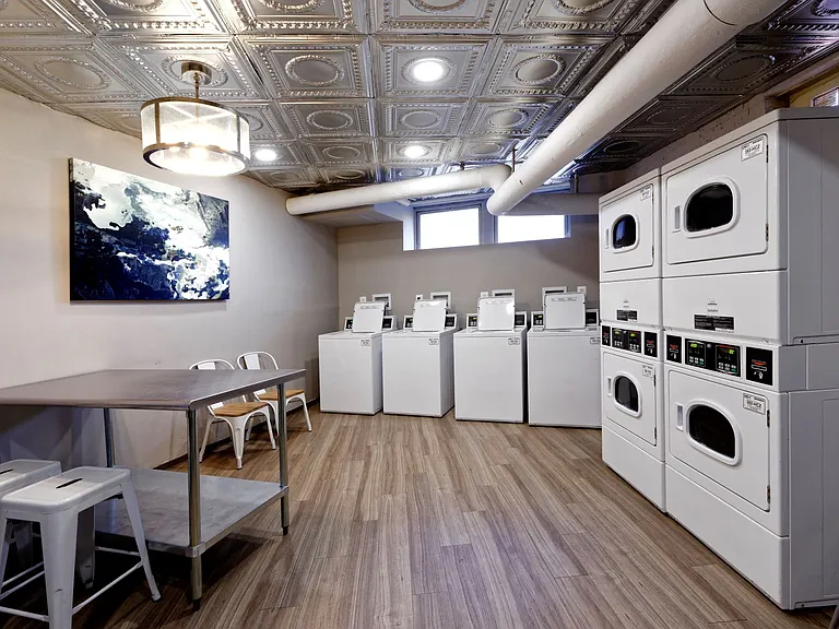 Laundry room with seating area