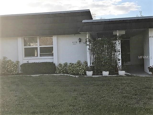 Private Patio off the carport at your front door