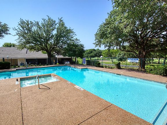 Pool with park behind