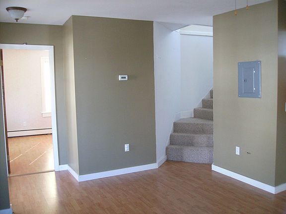 pergo and berber carpeting throughout