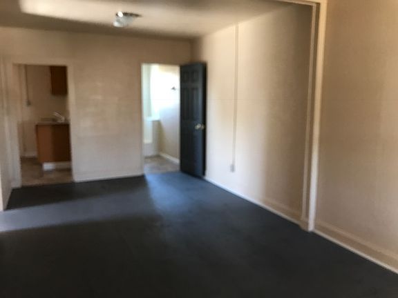 Large and airy living room that leads to private 2nd floor c