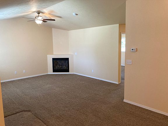 View towards living room with gas fireplace