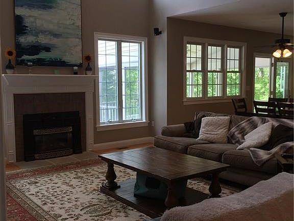 Living room flows to the dining area and kitchen.  Great layout for family gatherings or large get togethers