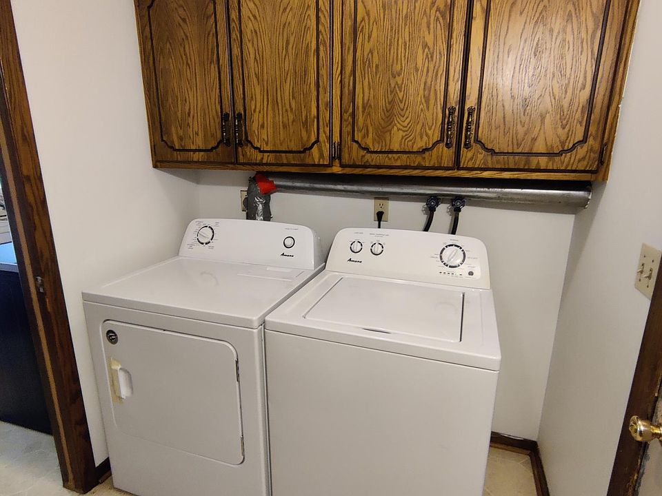 Mud room. Door to the right goes into 2 car garage. Door to the left goes into the kitchen.