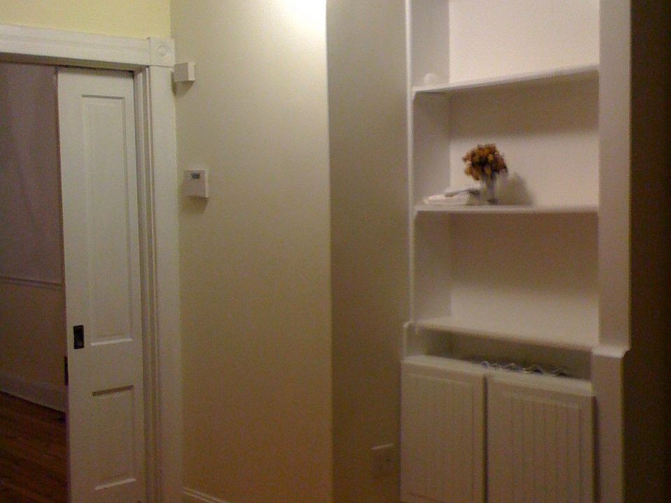 Pocket doors, built-in shelfs, hardwood floors