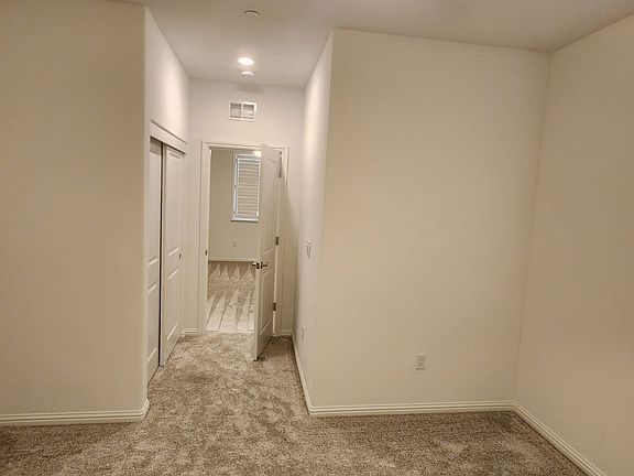 Bedroom with sliding door closet
